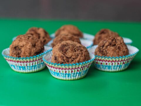 Finished no-bake brownie balls served in mini muffin cups