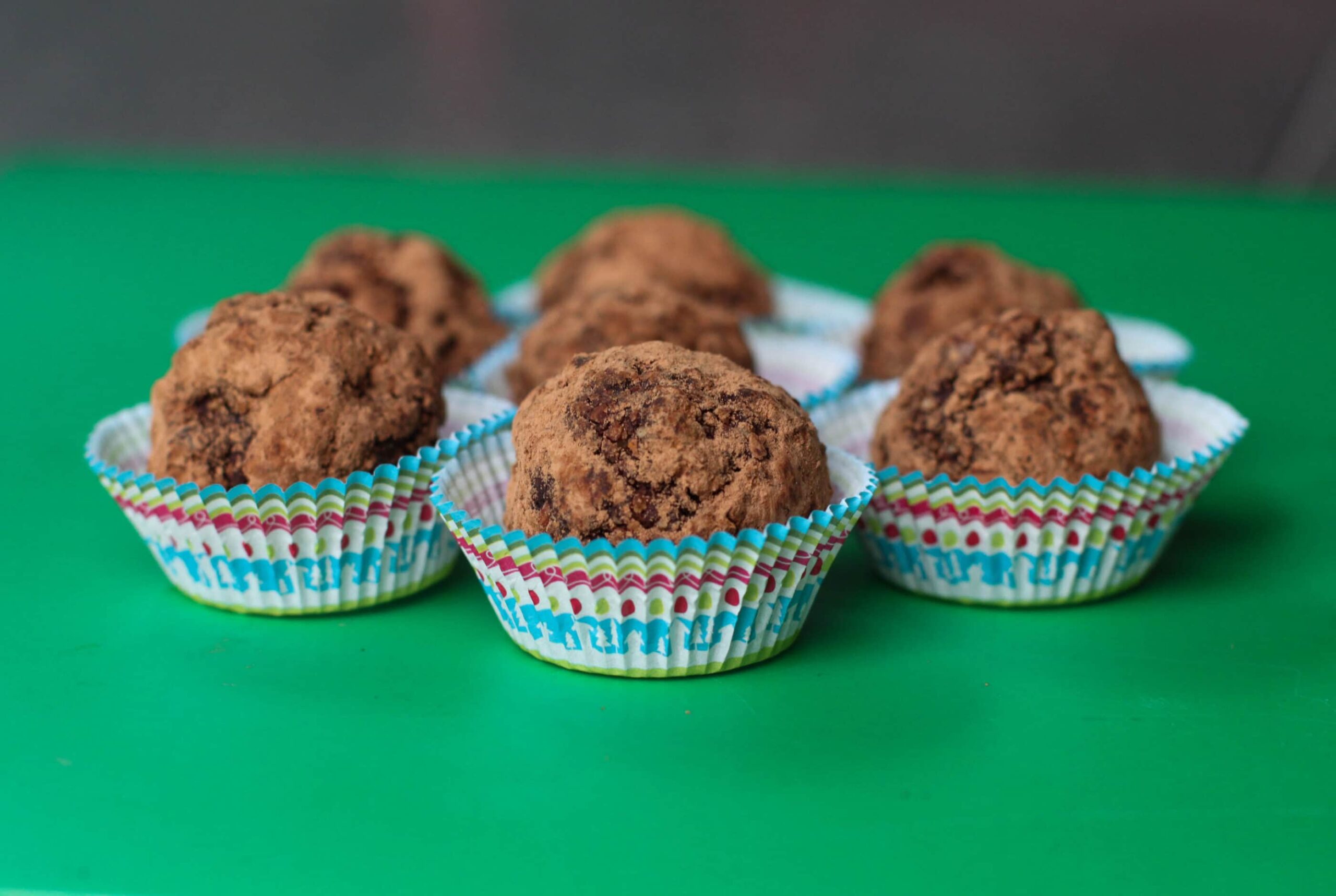 Finished no-bake brownie balls served in mini muffin cups