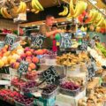 A fruit and vegetable stand at La Boqueria Market in Barcelona