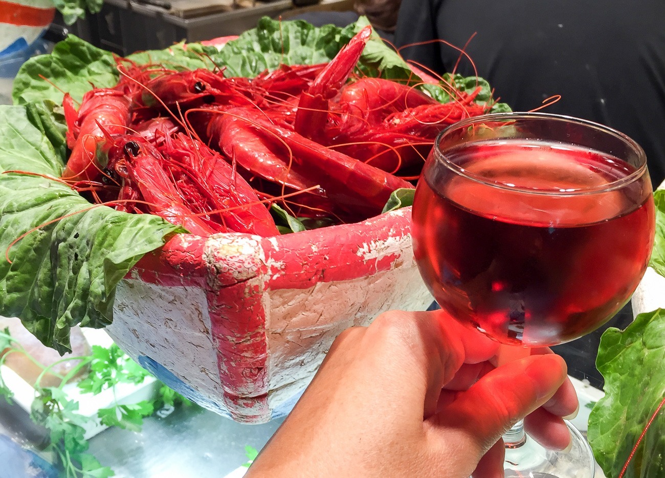 Fresh seafood and rose at BarCentral in Barcelona's La Boqueria food market.