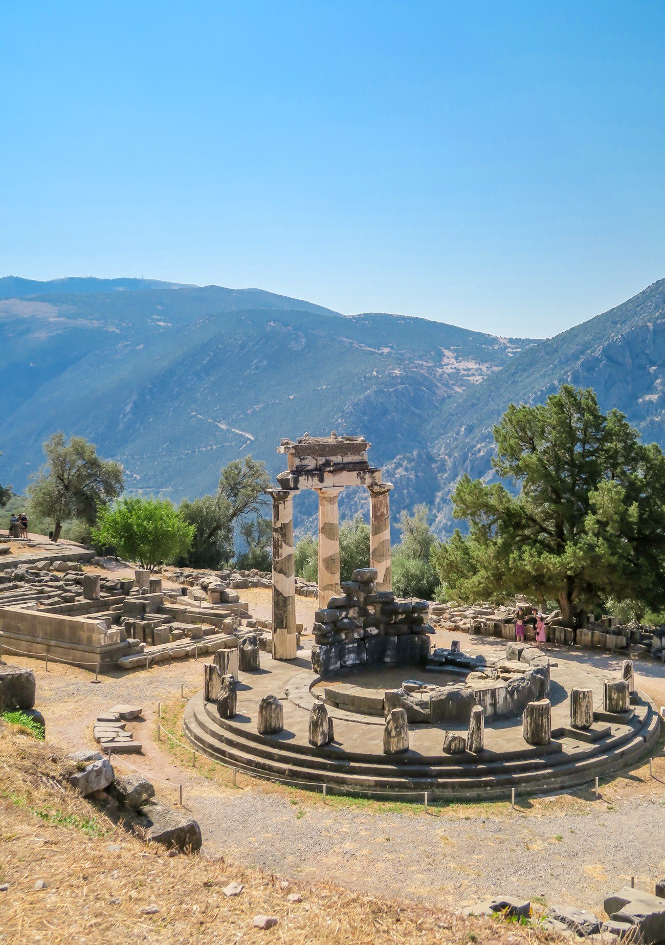 A view looking down on the sanctuary of Athena Pronaia at Delphi in Greece.