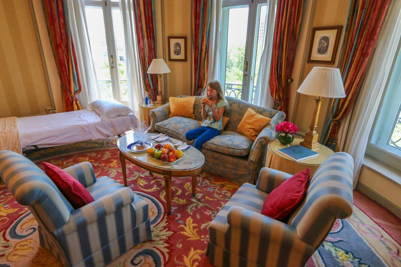 The living room of a deluxe suite at Hotel Ritz Madrid