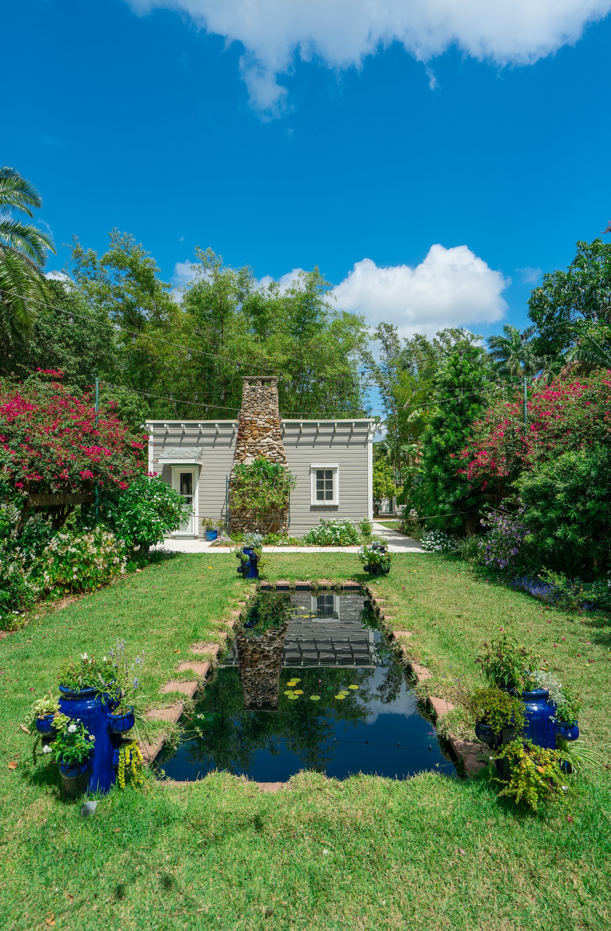 The Moonlight Garden at the Edison & Ford Winter Estates where the moon's reflection can be seen in this pool.