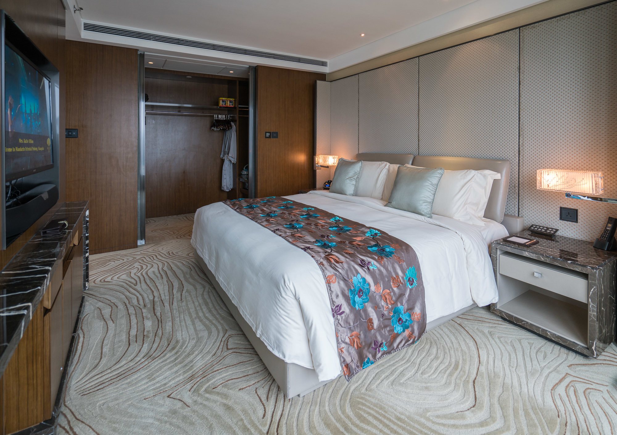 The gorgeous bedroom in a Club Level Suite at Mandarin Oriental Pudong, Shanghai.