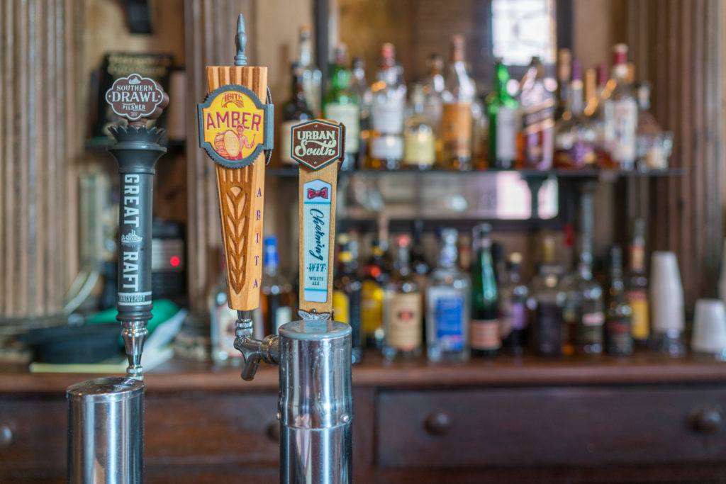 Taps on the oldest standing bar in New Orleans at Tujague's.