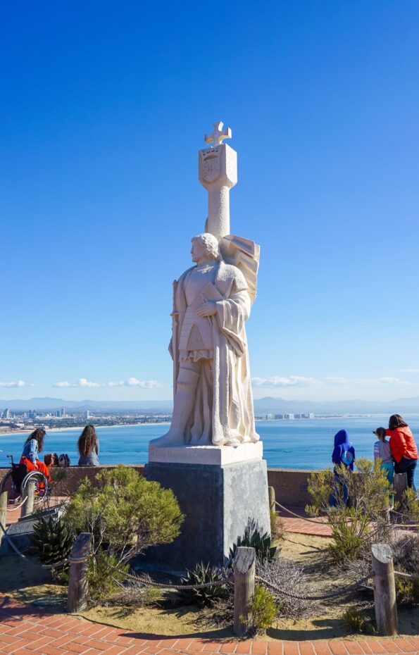 My daughter's school class looks at the view past the monument of Juan Rodriguez Cabrillo.
