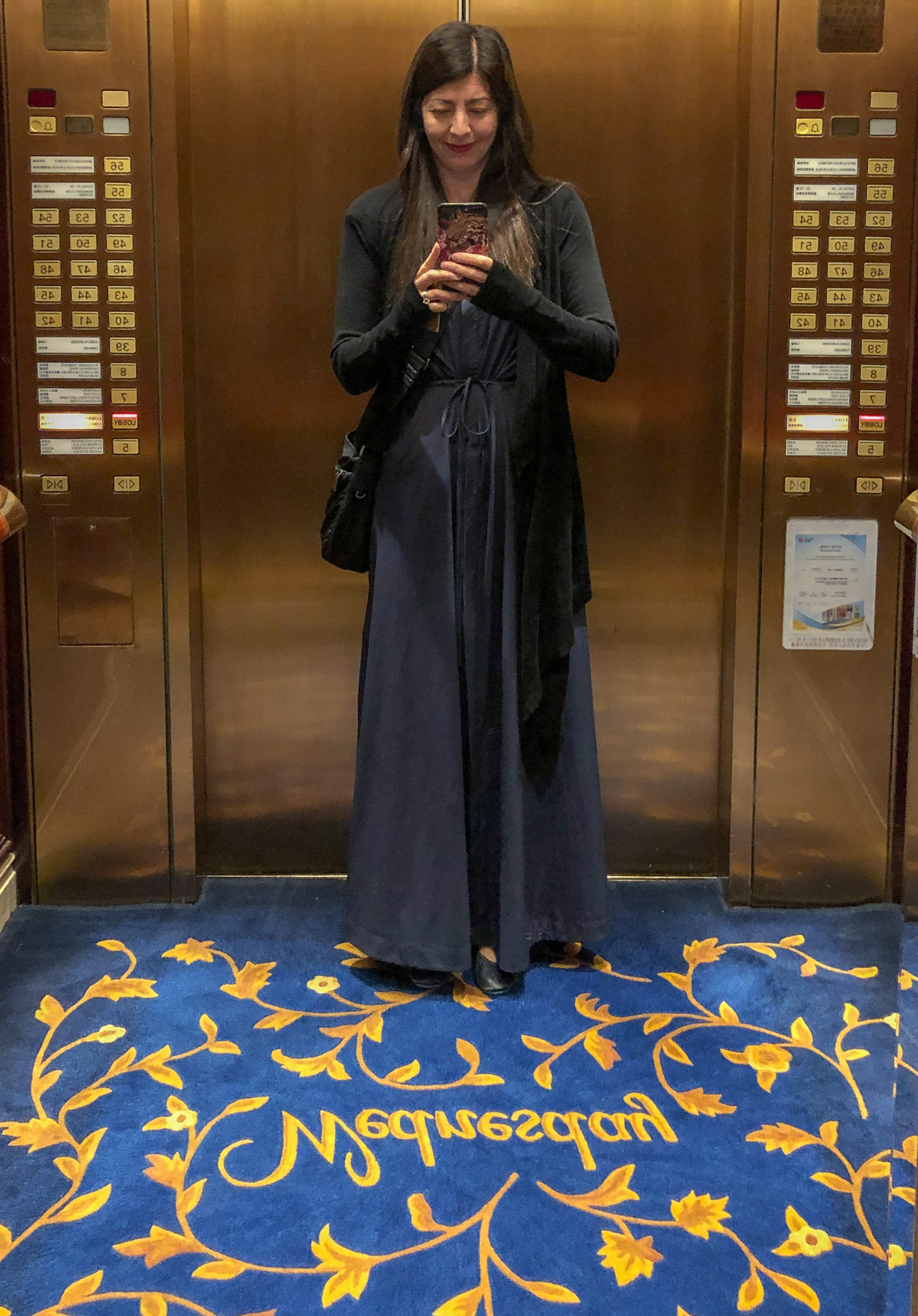 Elevators with days of the week at Island Shangri-la Hong Kong hotel