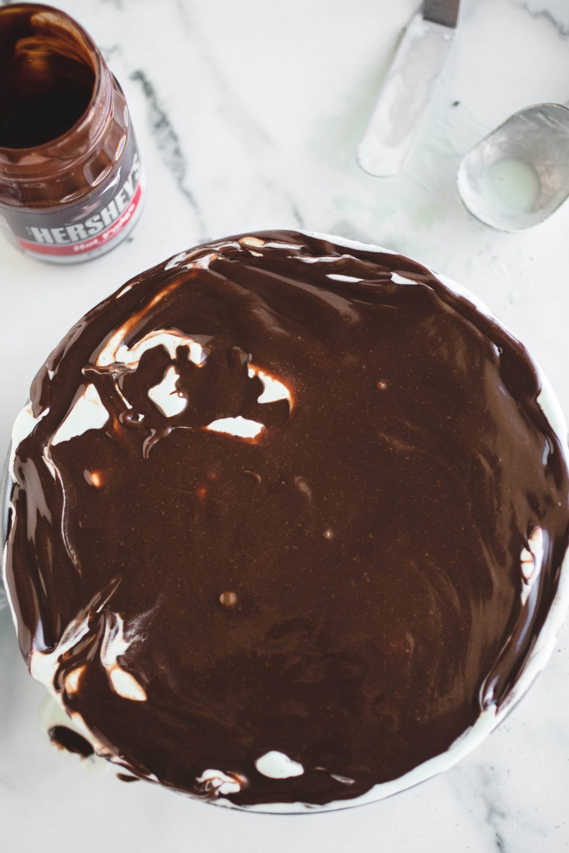 Chocolate sauce on Thin Mints ice cream pie