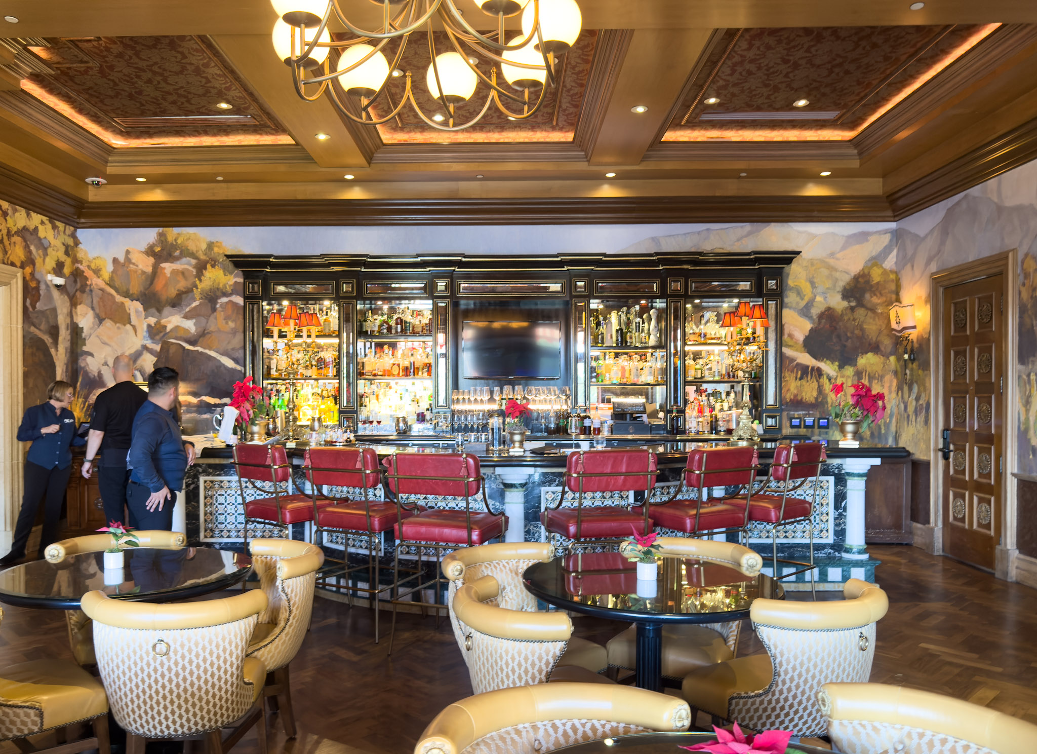 Waitstaff prepare the bar area in the Lobby Lounge at Fairmont Grand Del Mar.