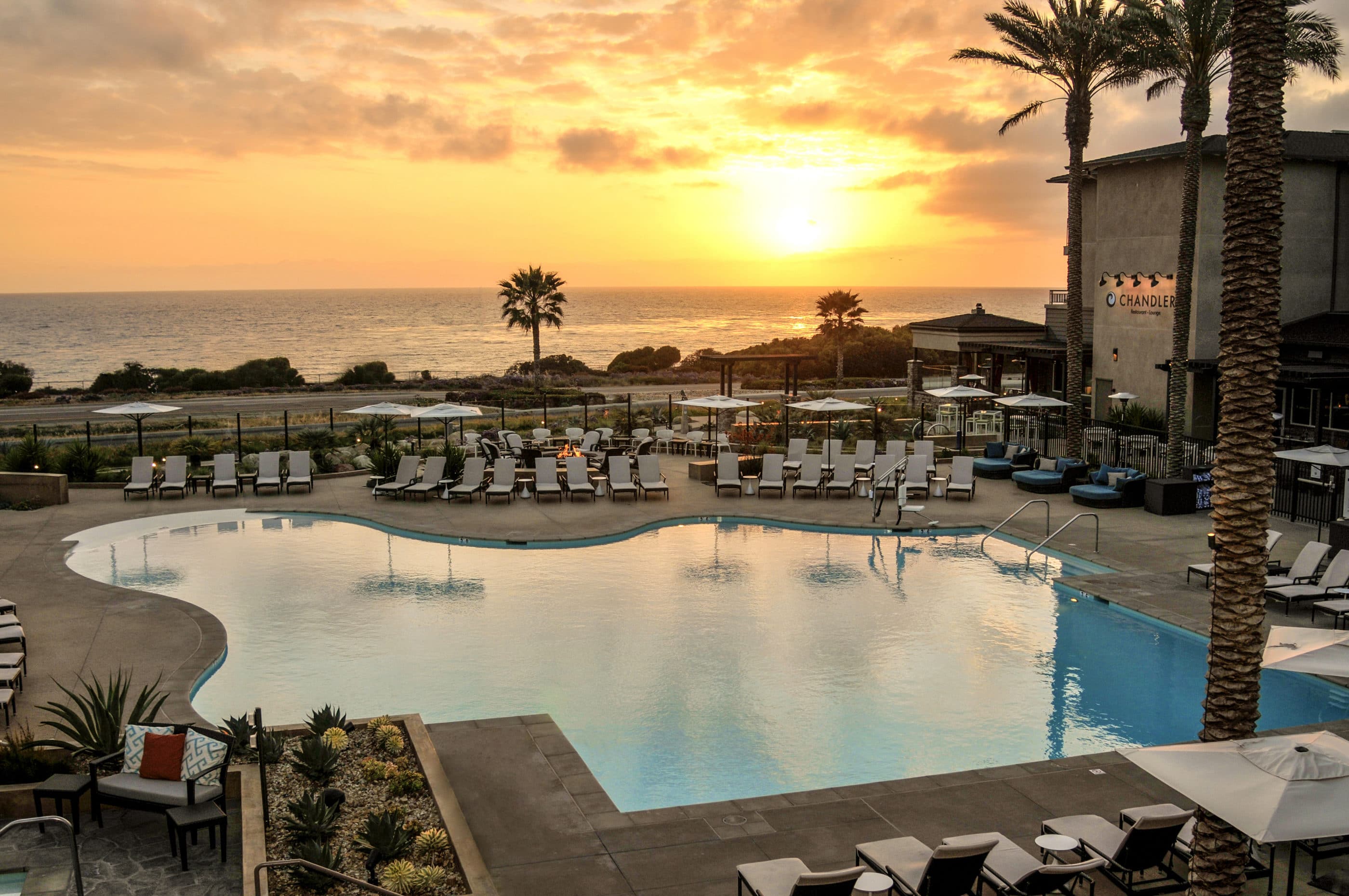 The pool at Cape Rey, an oceanfront San Diego hotel in Carlsbad, overlooks the beach.