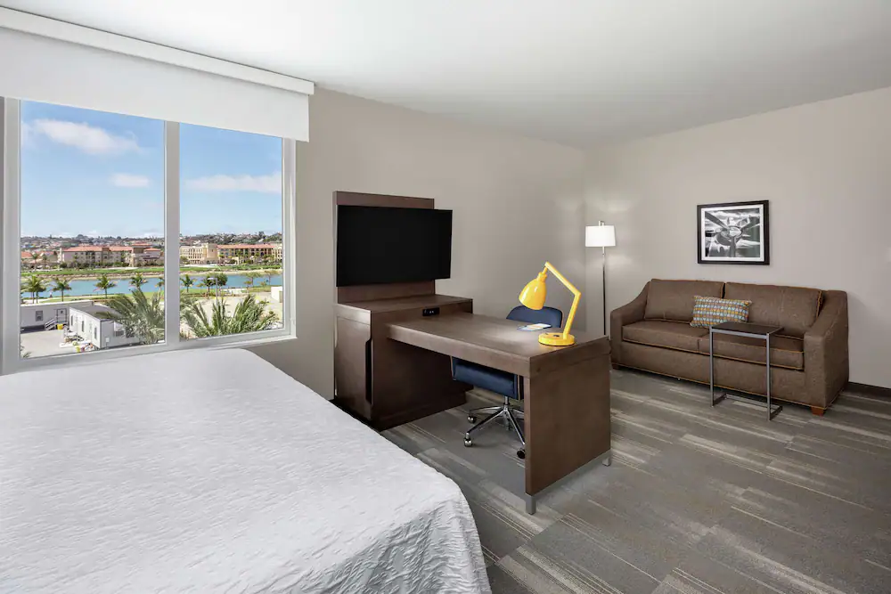 Room with desk and view at Hampton Inn Libety Station hotel near San Diego Airport