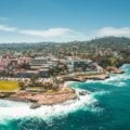 Aerial view of La Jolla, California beaches, businesses and homes.