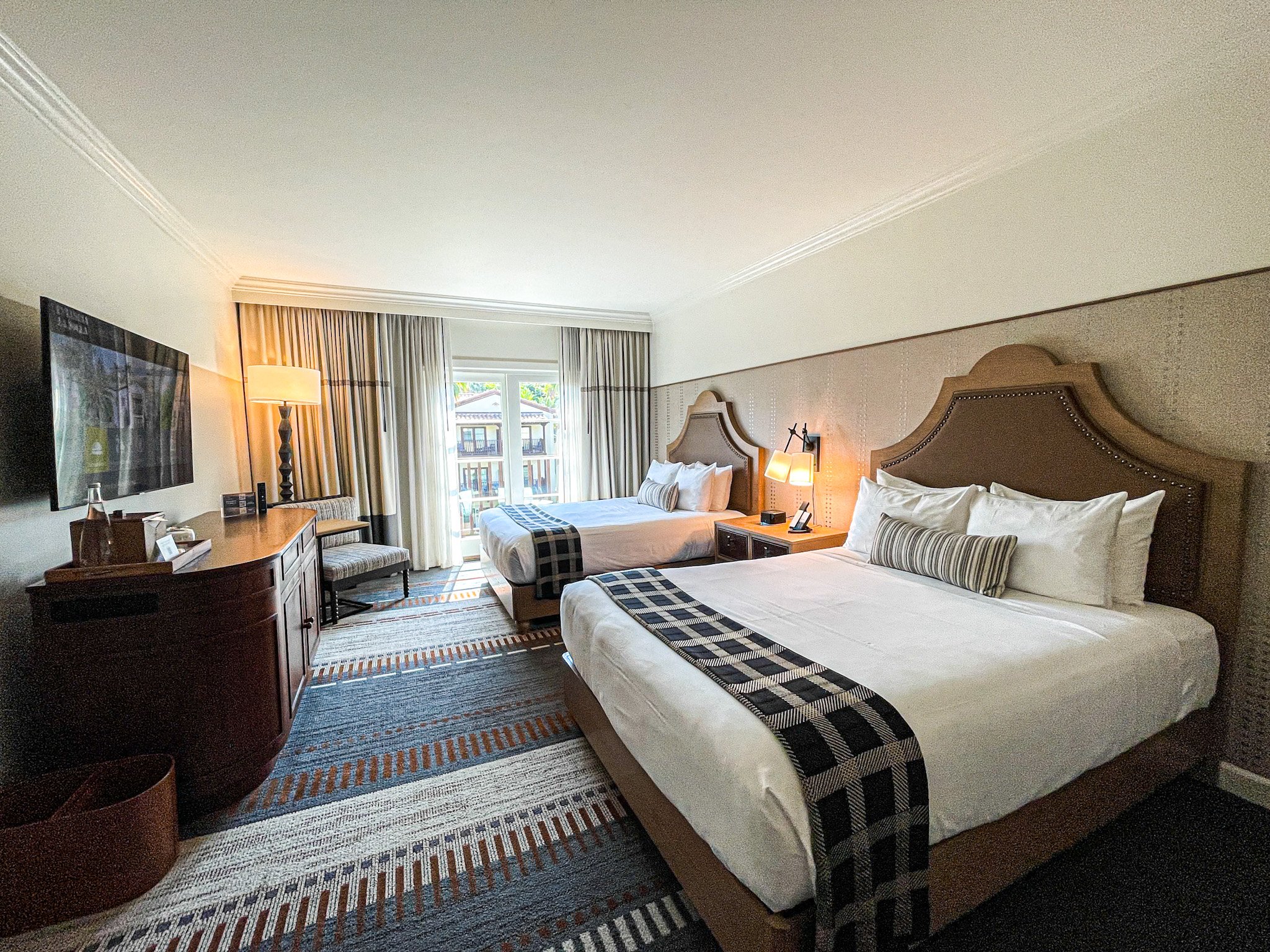 A two queen room at Estancia La Jolla