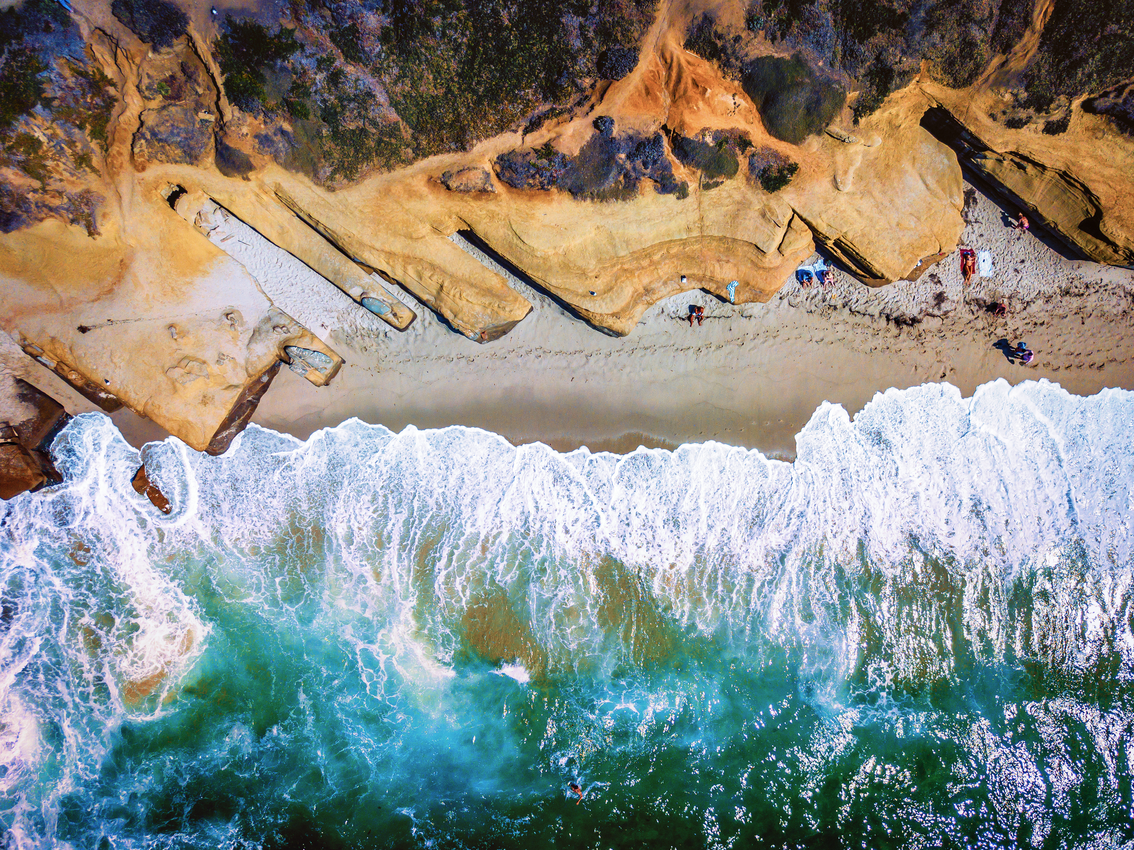 Aerial view of the cliffs and shoreline of Wipeout Beach in La Jolla.