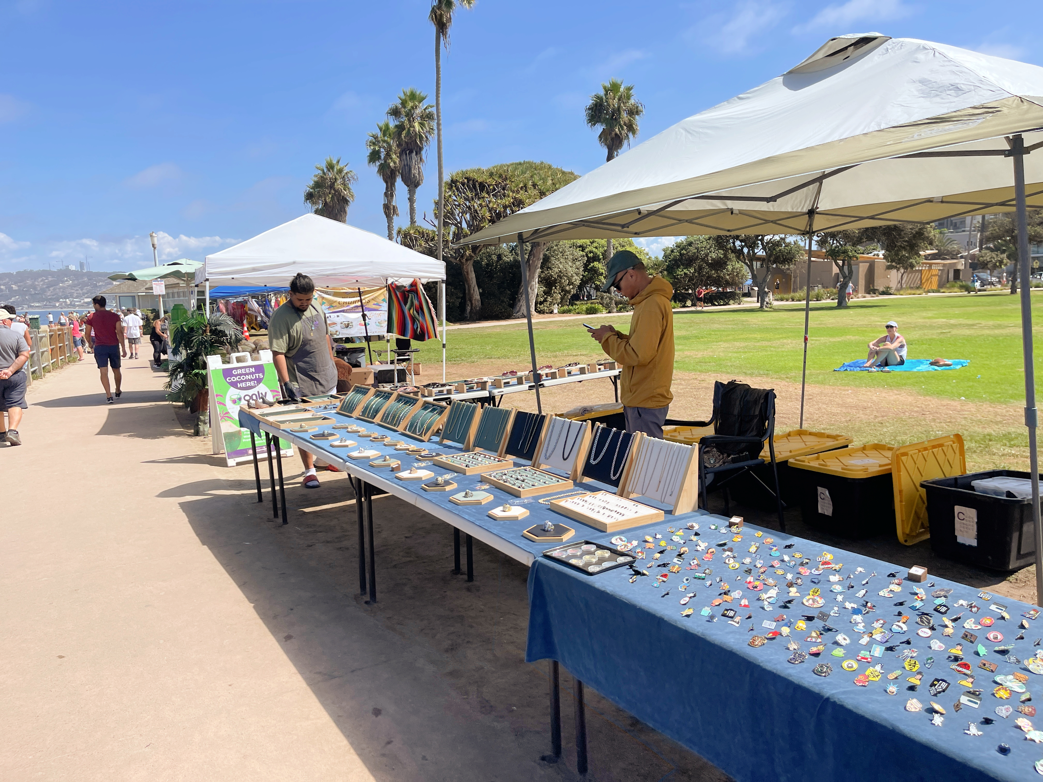 Vendors sell items at La Jolla Cove.