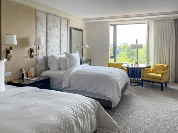 Deluxe Garden-View Room interior with two double beds.