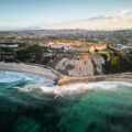 Aerial view of The Ritz-Carlton Laguna Niguel sitting above the ocean.
