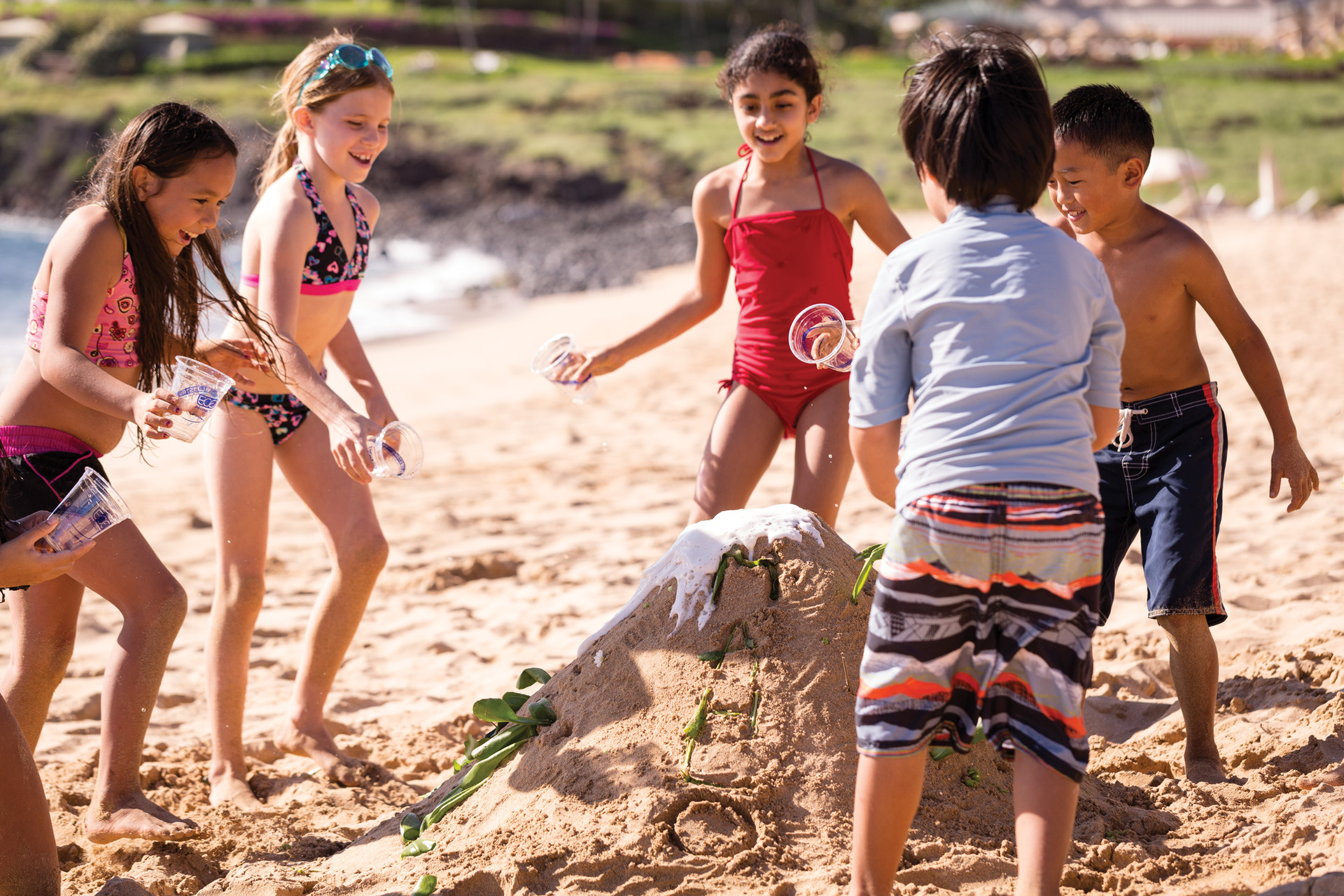 Children playing at the Beach at Four Seasons Lanai.