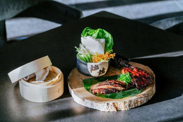 Five-Spiced Half Duck on a table at Aramara restaurant at Four Seasons Punta Mita.