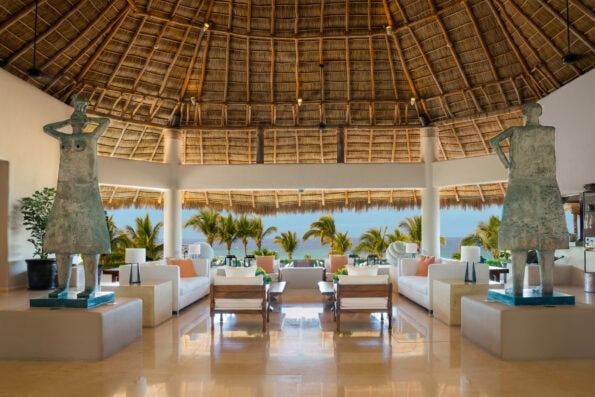 View through the open-air lobby to the ocean.