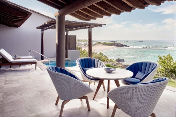 The oceanfront suite's patio with plunge pool and ocean view.