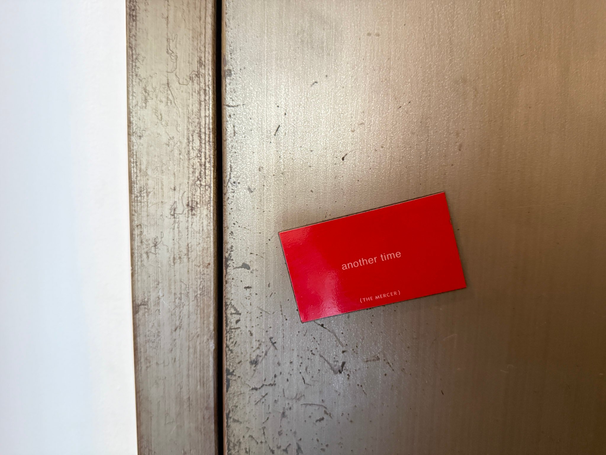 Magnetic Mercer Hotel Do Not Disturb Sign.