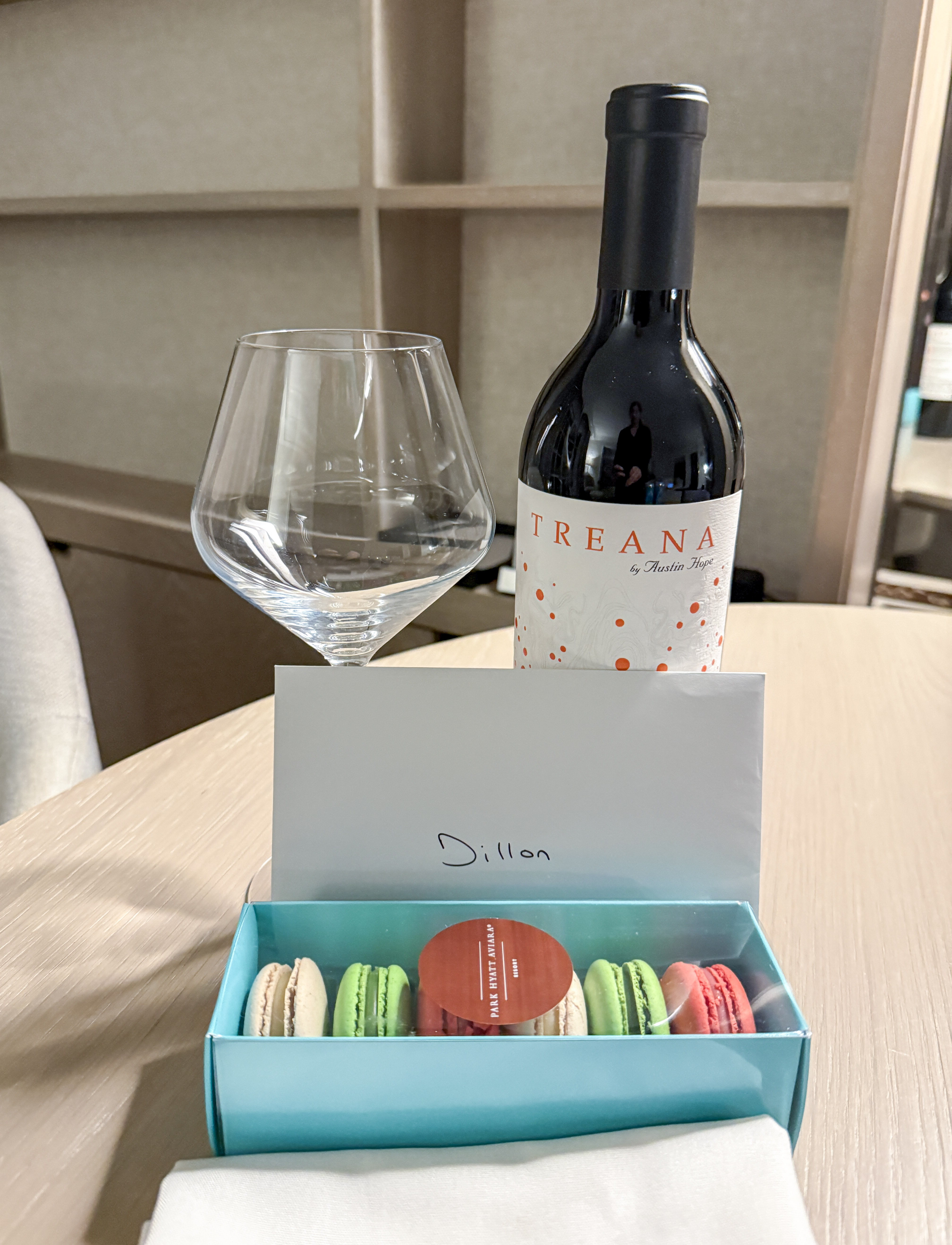 My welcome amenity at Park Hyatt Aviara of red wine and macarons.