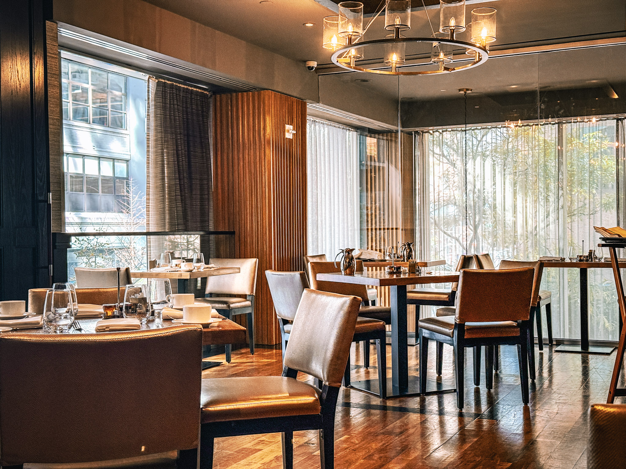Briefly empty dining tables near where we sat at Mezzanine.