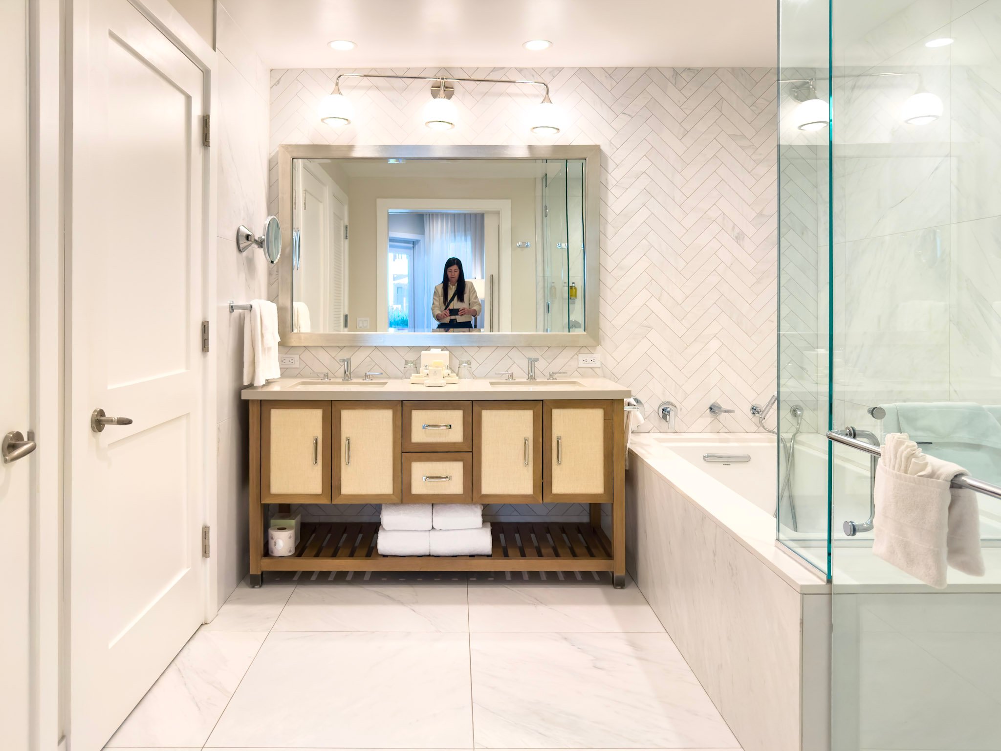 A villa bathroom with tub and shore at Shore House at The Del.