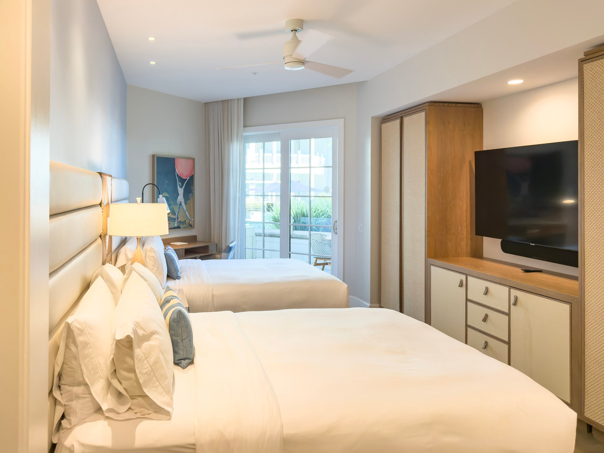 A two queen room interior at Shore House at The Del