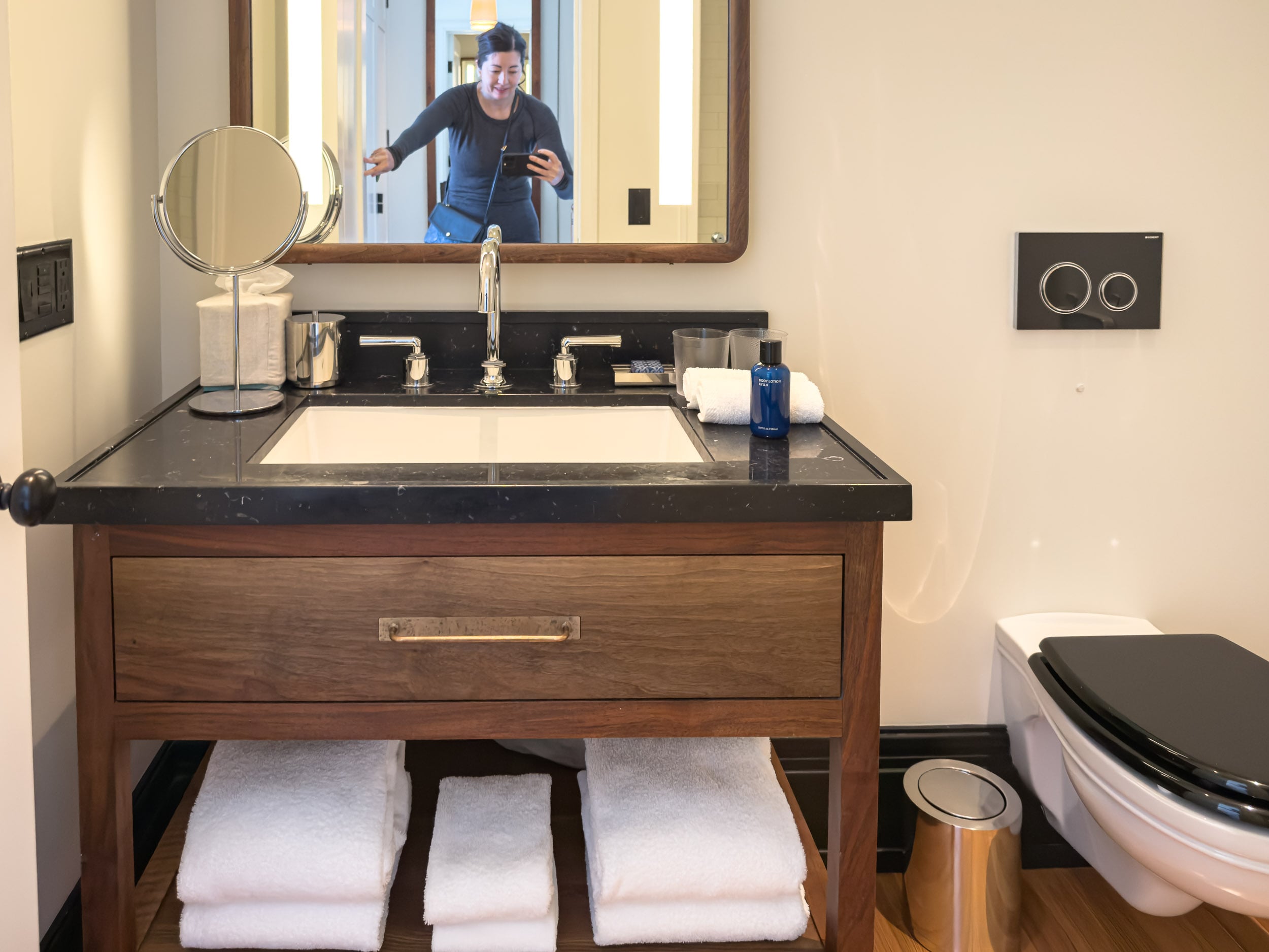 The bathroom vanity in a Classic Queen room at Nine Orchard