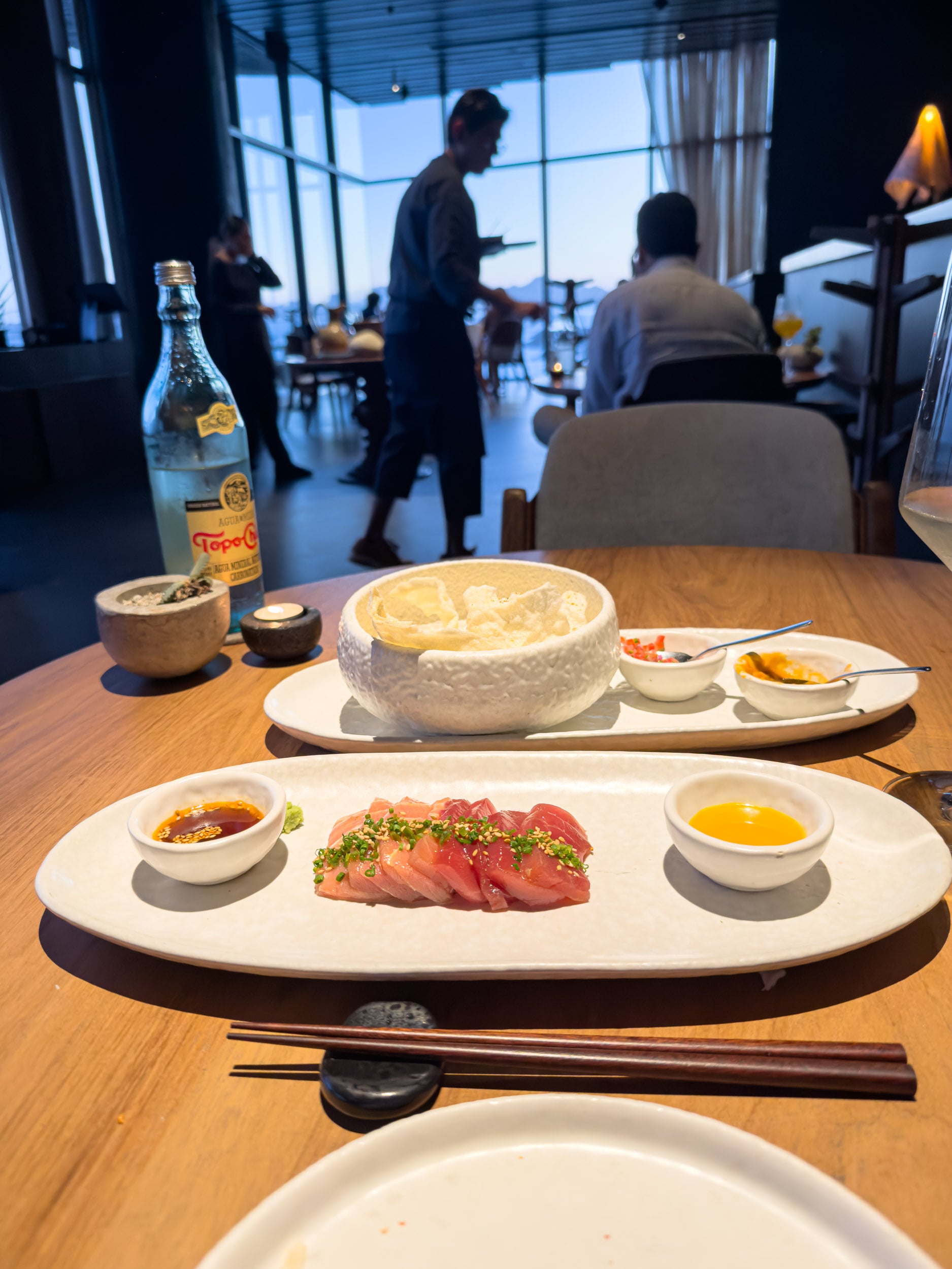 Tuna sashimi with dipping sauces at dinner at The Cape, a Thompson Hotel in Cabo San Lucas