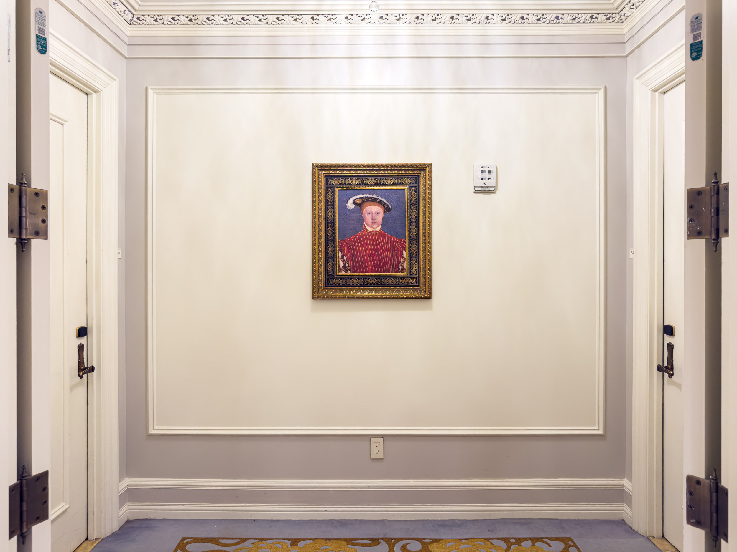 Hallway showing connecting room doors between guest rooms at The Plaza Hotel New York