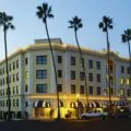Exterior of Grande Colonial hotel in La Jolla at sunset