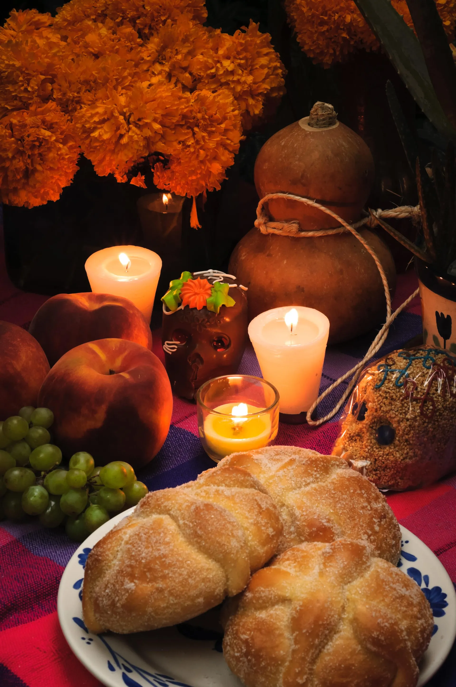 Pan de muerto on a Dia de los Muertos altar