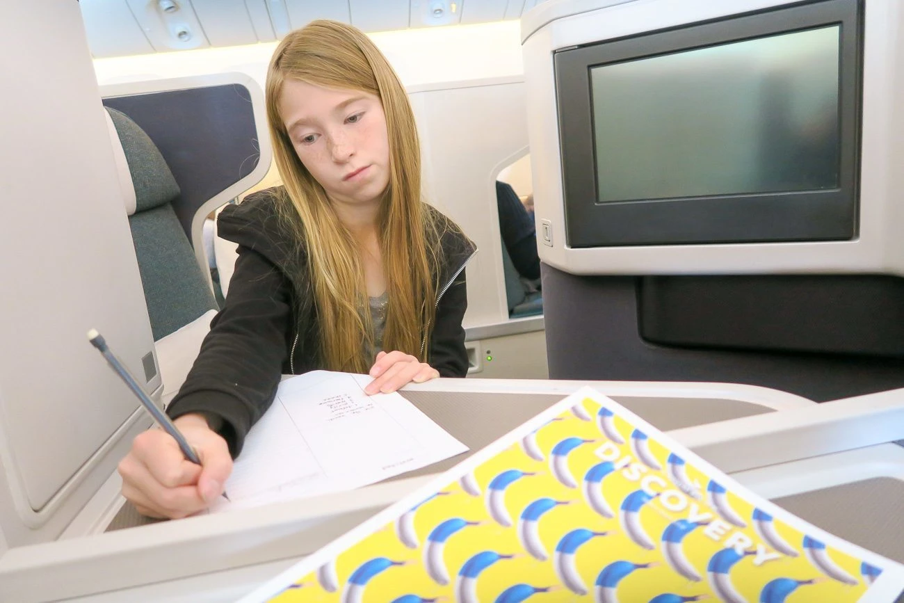 Learn where to sit in business class on Cathay Pacific with kids