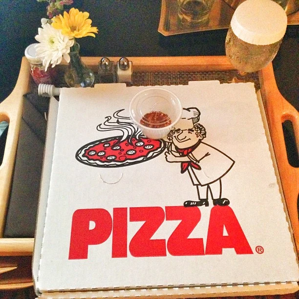 Room service pizza box at Hilton Orange County Costa Mesa