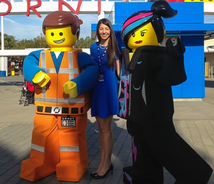I stand with LEGO movie characters during the press junket at LEGOLAND.