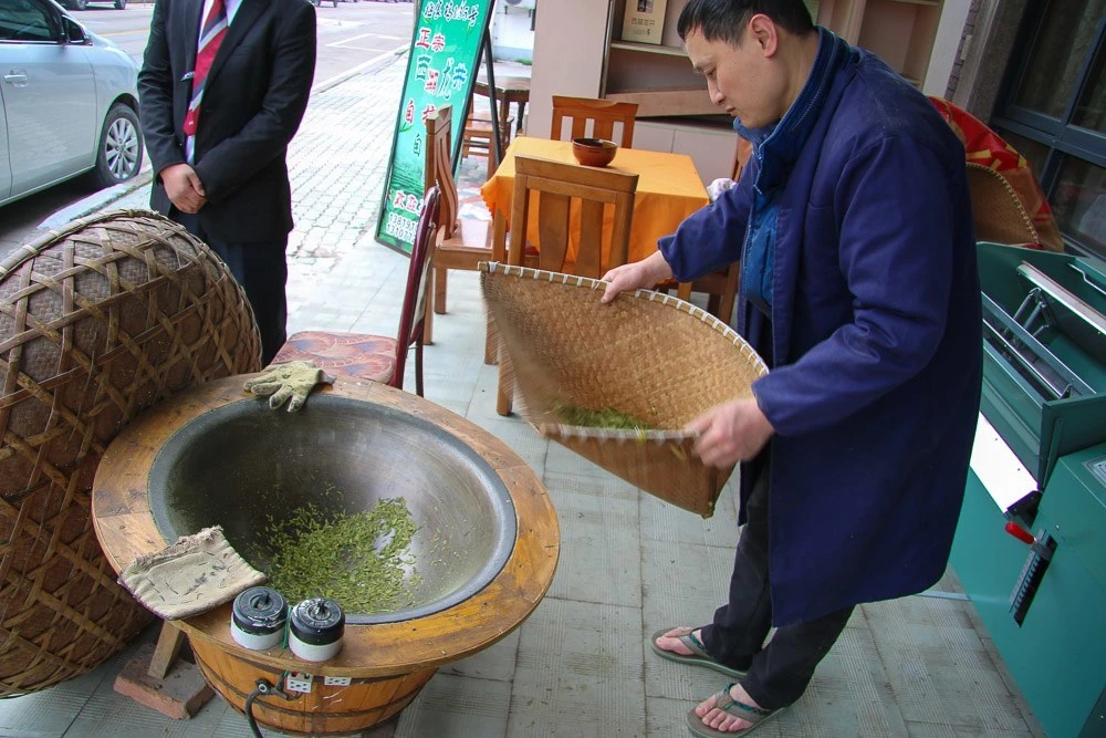 hangzhou longjing tea sifting by hand