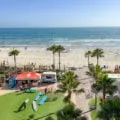 View of the surfboard rentals and the ocean beyond at Hotel del Coronado.