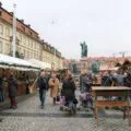 People walking through the stalls at the Bamberg Christmas Market