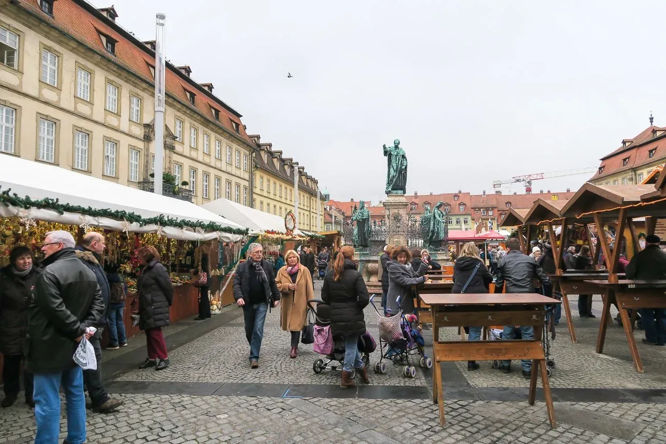 People walking through the stalls at the Bamberg Christmas Market