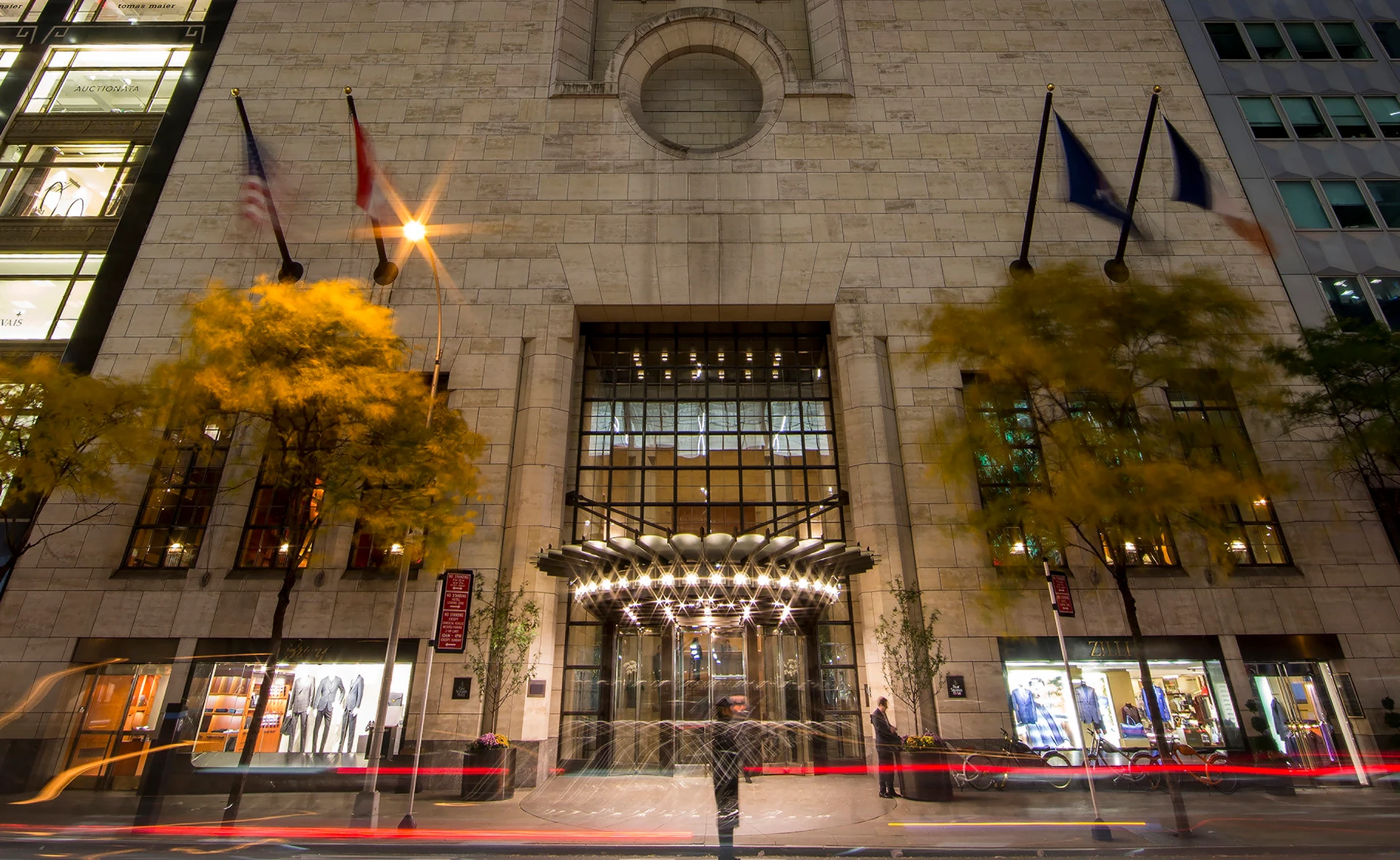 Evening view of the front entrance to Four Seasons New York.