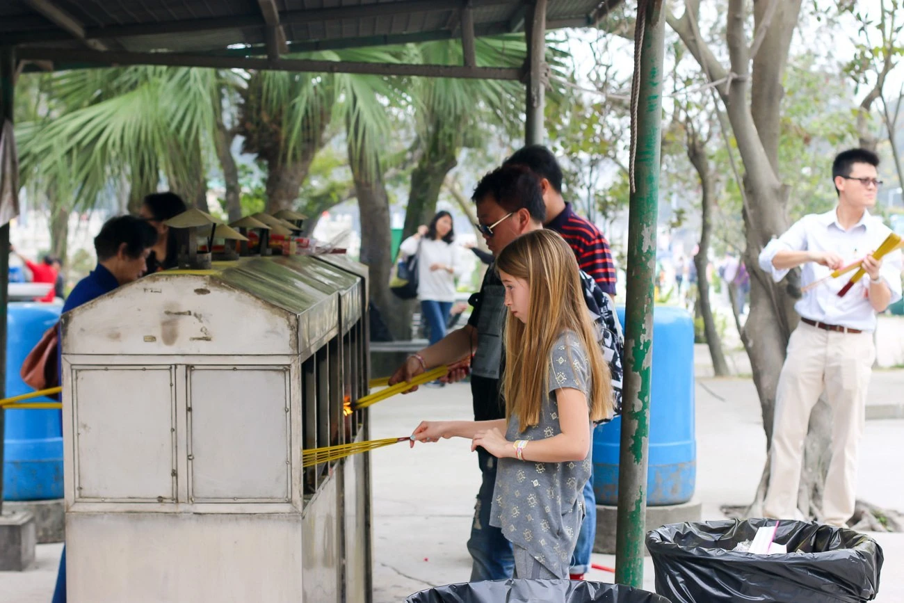 Anyone can buy incense to burn as an offering to Buddha at Hong Kong's Po Lin Monastery