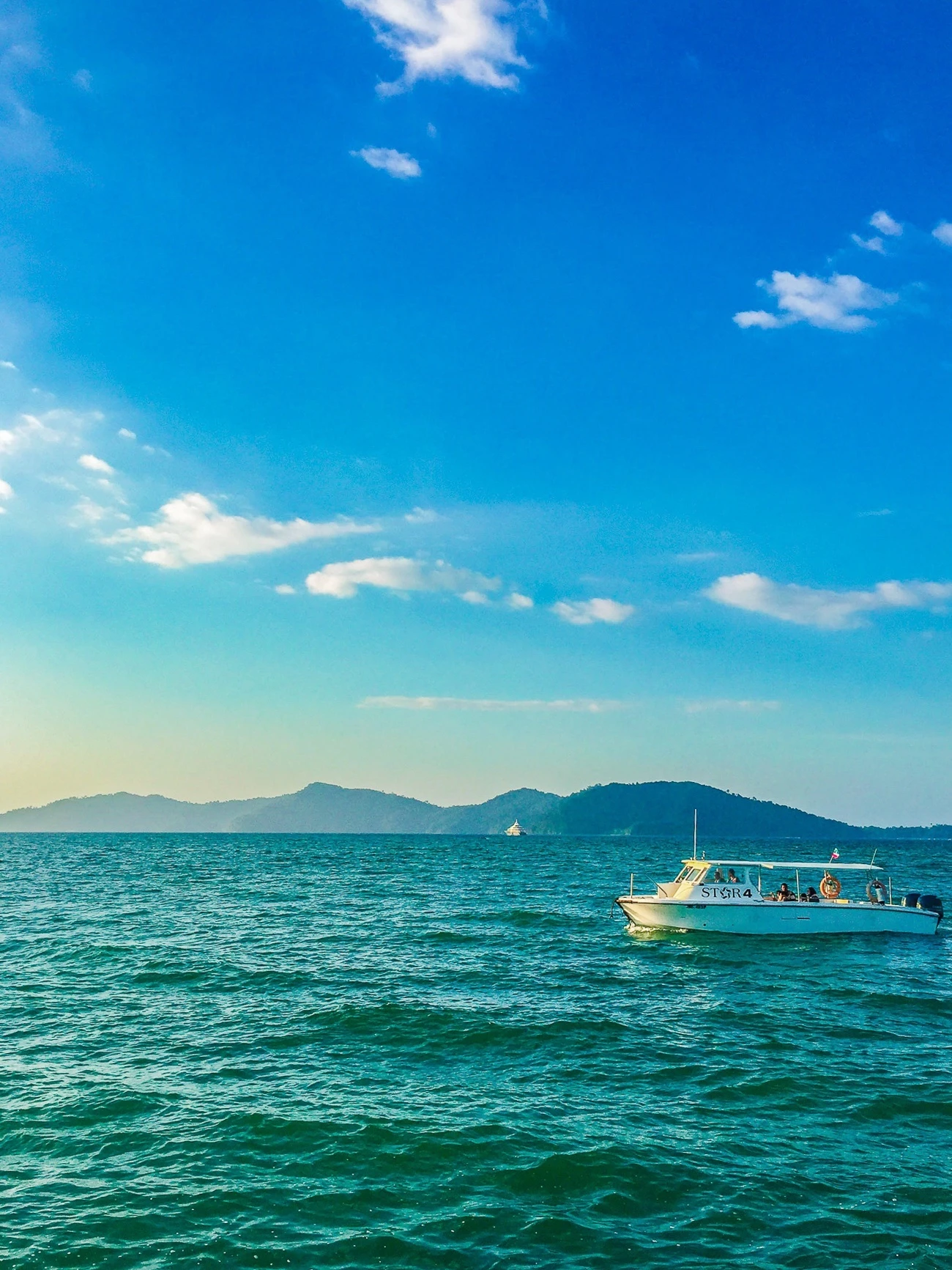 One of Shangri-la's Tanjung Aru Resort and Spa's STAR Marina boats in the South China Sea waiting for sunset.