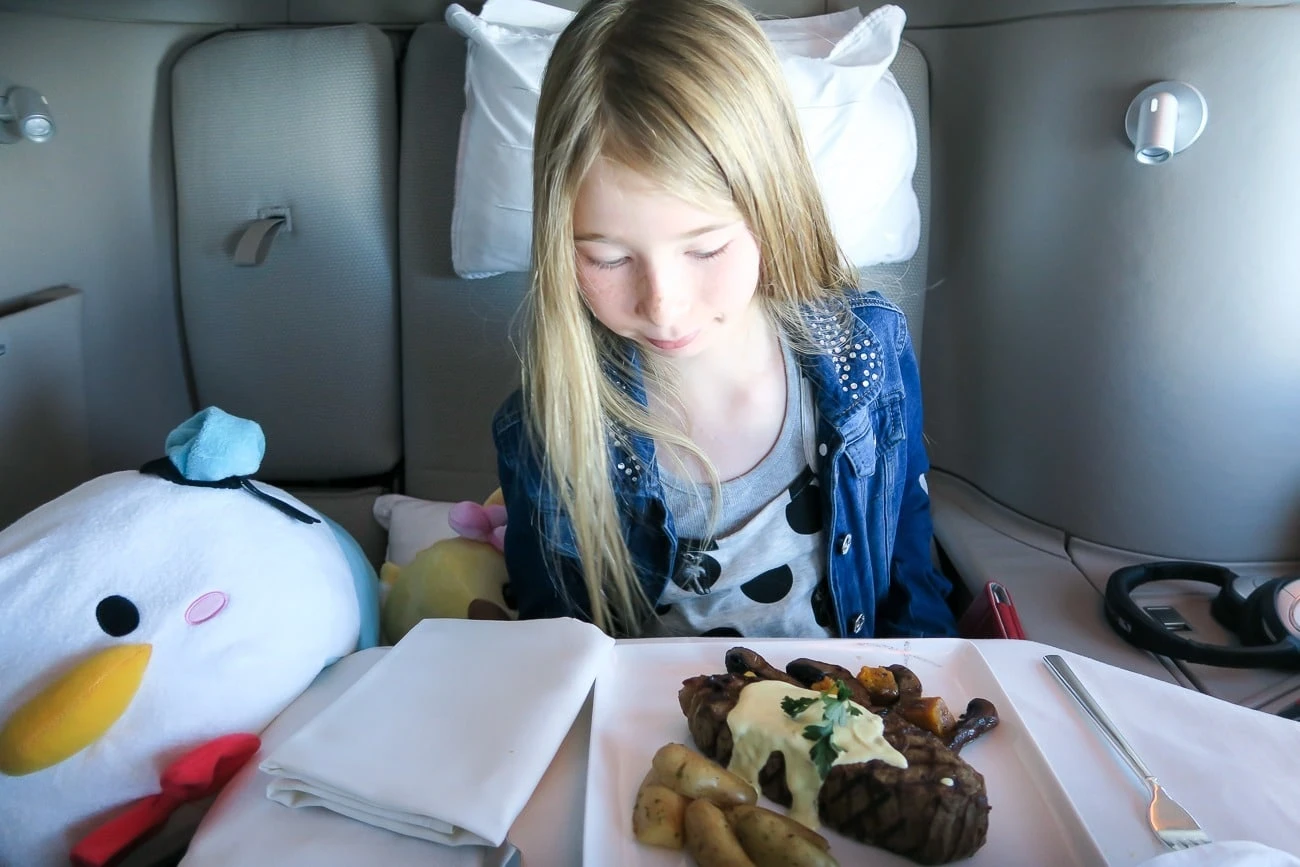 A giant striploin steak served in Cathay Pacific first class.