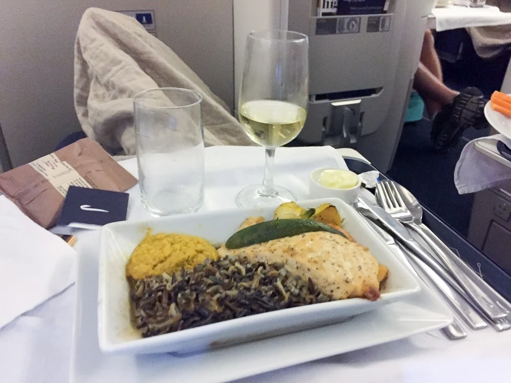 An unappetizing salmon with rife pilaf entree (overcooked)