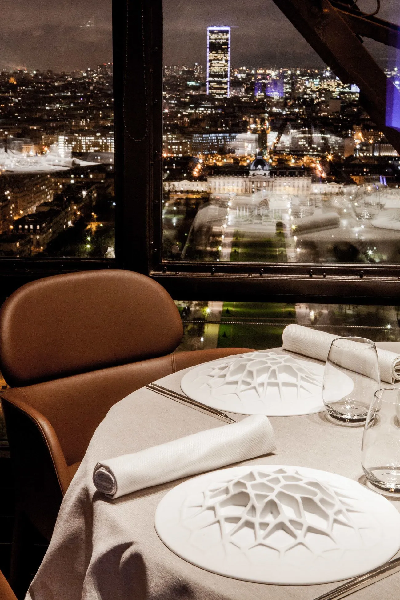 The view from Le Jules Verne restaurant on the second floor of the Eiffel Tower in Paris is spectacular at night, especially paired with a Michelin-star dinner.