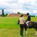 Kids can "own a pony" at Four Seasons Hotel Hampshire, England. The luxury hotel has an onsite equestrian centre with 14 horses.