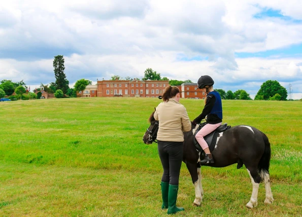 Kids can "own a pony" at Four Seasons Hotel Hampshire, England. The luxury hotel has an onsite equestrian centre with 14 horses.